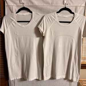 Two Lululemon Swiftly Short Sleeve Waist Length Shirts Size 10
